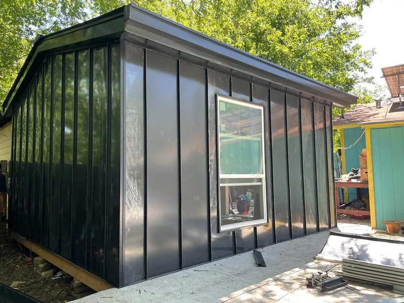 Black standing seam metal wall panels for Roof Inspection in Lamesa